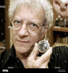 Louis Daniel Brodsky holds in St. Louis Wednesday, June 29, 2005, the  pocket watch that William Faulkner kept