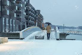 Winds variable at 20 to 25 mph (32.2 to 40.2 kph) (32.2 to 40.2 kph). Man In Winter Coat With Umbrella In Snow Fall Day In Oslo Norway Stock Photo Picture And Royalty Free Image Image 115315052
