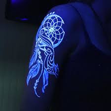 30 Glow In The Dark Tattoos That Ll Make You Turn Out The Lights Dark Tattoo Black Light Tattoo Uv Ink Tattoos