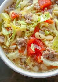 Bring to the boil and add the cabbage, then simmer for 5 minutes. Italian White Bean Cabbage And Sausage Soup Barefeet In The Kitchen