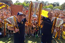 Who might need a few more years as an understudy to alastair clarkson before taking on a senior position. Alastair Clarkson And Luke Hodge Hold Up The Three Premiership Cups At Glenferrie Oval Abc News Australian Broadcasting Corporation
