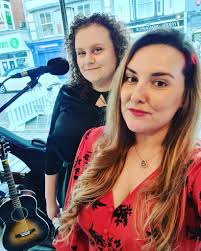 Hi ❤ We wanted to introduce ourselves. The rock chick in black is Ami Leigh  Music And there's me 🙋‍♀️ Lady in red Jenna Louise Music We are both  singer/songwriters in our