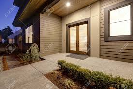 We did not find results for: New Construction Home Exterior With Contemporary House Plan Features Covered Entrance Porch With Modern Glossy Double Door Sunset View Northwest Usa Stock Photo Picture And Royalty Free Image Image 70106725