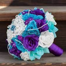 Made with over three dozen of calla lilies for a lush and full bouquet! Add Green And Do Jewels Instead Of Pearls Royal Purple And Turquoise Large Bridal Bouquet Red Bouquet Wedding Purple Bridal Bouquet Turquoise Wedding Bouquets