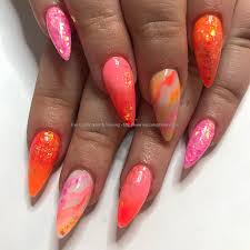 Eye Candy Nails Training Nail Art Gallery The nails are all light purple but three are covered in glitter and the other two have a beautiful rhinestone design.