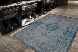 The 'medallion' rugs are from the 'fading world' collection, produced by the belgium manufacturers louis de poortere. Buy Louis De Poortere Fading World Grey Turquoise Rugs Buy Grey Turquoise Rugs Online From Rugs Direct