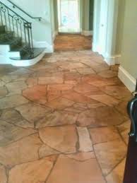 Flagstone flooring is where the natural shapes of the stones are used as part of the design rather than cutting every tile into a square shape. Dallas Flagstone Floor Restoration Cleaning Polishing Refinishing Sealing Plano Ft Worth