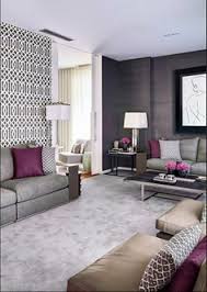 This is an example of a medium sized traditional grey and teal enclosed living room in hertfordshire with grey walls, carpet, a wall mounted tv, grey floors, a wood burning stove and a metal fireplace surround. Living Room Grey Purple Living Room Plum Living Room