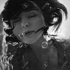 Check spelling or type a new query. Mermaid Face With Hair Floating In Water Black And White Stock Photo Picture And Royalty Free Image Image 35815521