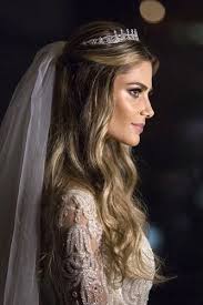Having long hair certainly has its advantages and the options increase exponentially with a few for a beach or seaside wedding, pinning sections of your hair back will be handy on windy days to keep you can also still wear a veil with an all out hairstyle but do ensure your hairstylist knows you want. Wedding Hairstyles For Long Hair With Veil And Tiara Addicfashion