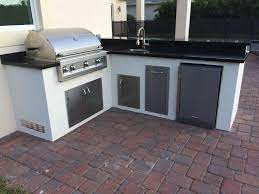 This new proposal is a tangible kitchen design all the kitchens are free standing, and every one contains all necessary equipments to cook outside. L Shaped Outdoor Kitchen For Toll Brothers With A Artisan Gas Grill Outdoor Kitchen Grill Outdoor Kitchen Grill Parts