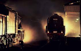 Steam Trains Passing At Night 9f No 92212 Stands In The Flickr