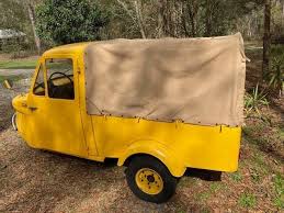 Image result for Medium Yellow 1964 Daihatsu