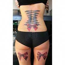 What Do Bow Tattoos On Back Of Legs Mean Tattoosonback Back Tattoo Corset Tattoo Back Of Thigh Tattoo