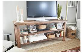 For this diy tv stand, frame your tv with log sections. 6 Diy Tv Stands That Hide Ugly Cable Boxes And Wires