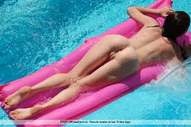 Nude and without bra damsels enjoying joy at the swimming pool - free-spirited bliss