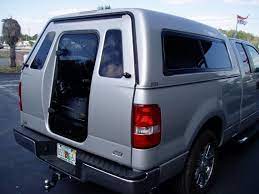 A R E Walk In Fiberglass Truck Toppers New Toppers A R E Truck Caps Truck Toppers Tonneau Covers Truck A Truck Toppers Truck Topper Camping Truck Topper