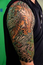 One popular way to get the japanese tiger tattoo is running down the arm in a sleeve fashion. Half Sleeve Quarter Sleeve Japanese Tattoos Novocom Top