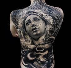 Roses and virgin mary tattoo design. 55 Lovely Virgin Mary Tattoo Ideas The Classy And Timeless Design