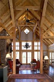 This economical home plan has beautiful decorative beams and sloped ceilings to enhance the interior. Homes By Mill Creek Post Beam Company