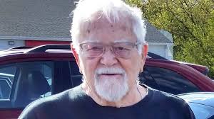 John E. Lampman Obituary (1928