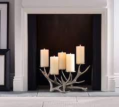 The desirable candle holders for fireplace mantel could perfectly create the elementary environment in the room and show the emphasizing comfortable atmosphere, which possibly widens the room and makes it bigger. Antler Fireplace Candelabra Candle Holder Pottery Barn