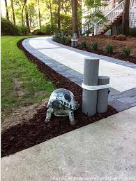 Maybe you would like to learn more about one of these? Concrete Walkway Transformed With Beautiful Cobble Stone Pavers Between Naps On The Porch