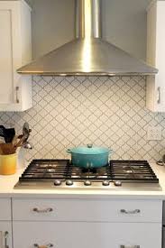 Designers would like to add arabesque backsplash tile if the other kitchen design elements are mostly neat and plain. 17 Arabesque Tile Backsplash Ideas Arabesque Tile Tile Backsplash Kitchen Backsplash