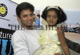 She was born in 1976 to father s.p. Cricketer Rahul Dravid With Tsunami Survivor Varsha At A Photo Exhibition Depicting The Trail Of The Hindu Images