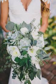 This succulent arrangement comes with a wide variety of rooted succulents, a colorful orchid all accented with colorful moss planted in a 17 this bouquet is created with a variety of succulents and splashes of color from statice flowers, clover and/or hypericum berries and/or kalonchoe blooms. 20 Succulent Wedding Bouquets Perfect For The Boho Bride Martha Stewart