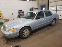 Image result for Light Ice Blue 2010 Crown Victoria