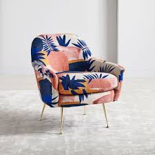 A pair of floral damask patterned fabric sofa armchairs with foam seat cushions and fibre back cushions. 7 Modern Floral Chairs That Ll Transform Your Space Architectural Digest