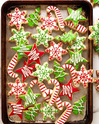 Frost each cookie with about 1 tablespoon of icing, using the back of a spoon to smooth icing in an even circle. Christmas Cookies Vanilla Biscuits Sugar Cookies Recipetin Eats