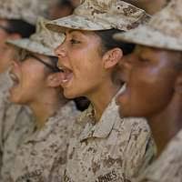 Quartermaster 3rd Class Michelle Perkins, assigned to Coastal Riverine  Squadron (CRS) 4, returns a tool after checking fuel levels while