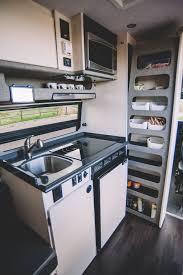 This Custom Camper Van Can Sleep A Family Of 6 Custom Camper Vans Camper Kitchen Camper Interior
