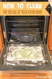 Lay out newspapers or paper towels on the floor around the base of your oven. How To Clean The Inside Of Your Oven Door Bitz Giggles