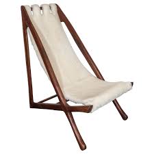 This one looks elegant as the glider comes with a yellow aluminum frame. A Scandinavian Midcentury Modern Sling Chair With Sheepskin Upholstery At 1stdibs