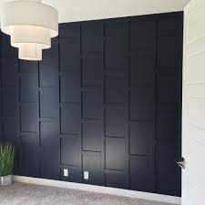 Navy Blue Is Everywhere And We Incorporated It Throughout This Home Can T Wait To See This Den Wooden Accent Wall Accent Walls In Living Room Wood Accent Wall