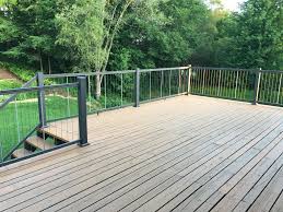 Cable railing is a bit more expensive than lumber but does not require the maintenance lumber requires. Keylink Vertical Cable Railing System Cable Railing Deck Cable Railing Vertical Cable Railing