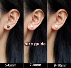 Maybe you would like to learn more about one of these? 9 10mm White Freshwater Pearl Stud Earrings Solid Sterling Silver Back Lily Treacy