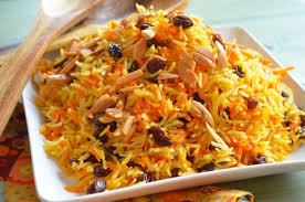 Add the rice, stock, ½ of the parsley, ½ of the almonds, the raisins, the onion mixture, the soy sauce, vinegar, black pepper and saffron threads. Rosh Hashanah Sweet Basmati Rice With Carrots And Raisins