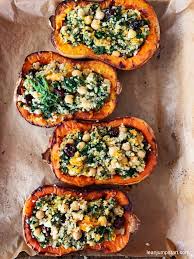 Stuffed Butternut Squash With Quinoa And Cranberries Recipe Vegan Christmas Dinner Recipes Butternut Squash Recipes