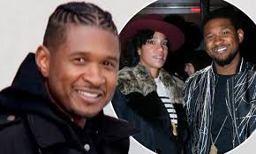 Usher smiles as he's pictured for the first time since filing for divorce  from wife Grace Miguel