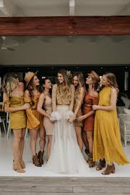 Boho Bride Inspiration Two Piece Gold And Cream Wedding Dress With Flared Sleeves Feather H Bridesmaid Dresses Boho Cream Wedding Dresses Orange Bridesmaid
