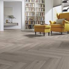 Why should herringbone be enjoying a grand renaissance? Kronotex Herringbone 8mm Oak Silver Laminate Flooring D3773 Leader Floors