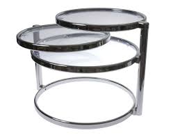 This coffee table comes in several color designs that allow combination with other furniture: Present Time Leitmotiv Double Swivel Glass Table Chrome Buy Online In Angola At Angola Desertcart Com Productid 104886069