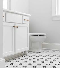 They also offer efficient performance and lasting durability. Penny Tile Arranged Into A Flower Pattern Black And White Floral Mosaic Floor Tile Fun Design White Van Penny Tiles Bathroom Penny Tile Black Floor Tiles