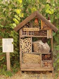Our Bug Hotel Is Open Come On In Garden Decor Projects Insect Hotel Upcycle Garden
