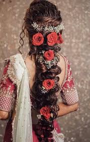 It shouldn't depend solely on what looks good on you, but should complement your wedding dress and neckline there are many types of necklines in wedding gowns and one hairstyle that looks adorable with one neckline may not look good with another style. 15 Indian Bridal Hairstyles With Flowers Candy Crow