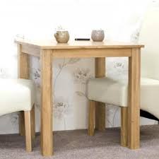This coffee table is a perfect solution to storing small items, like remotes and books, while still keeping them easily accessible. Opus Solid Oak Furniture 2 Seater Dining Room Table Fusion Furniture Store